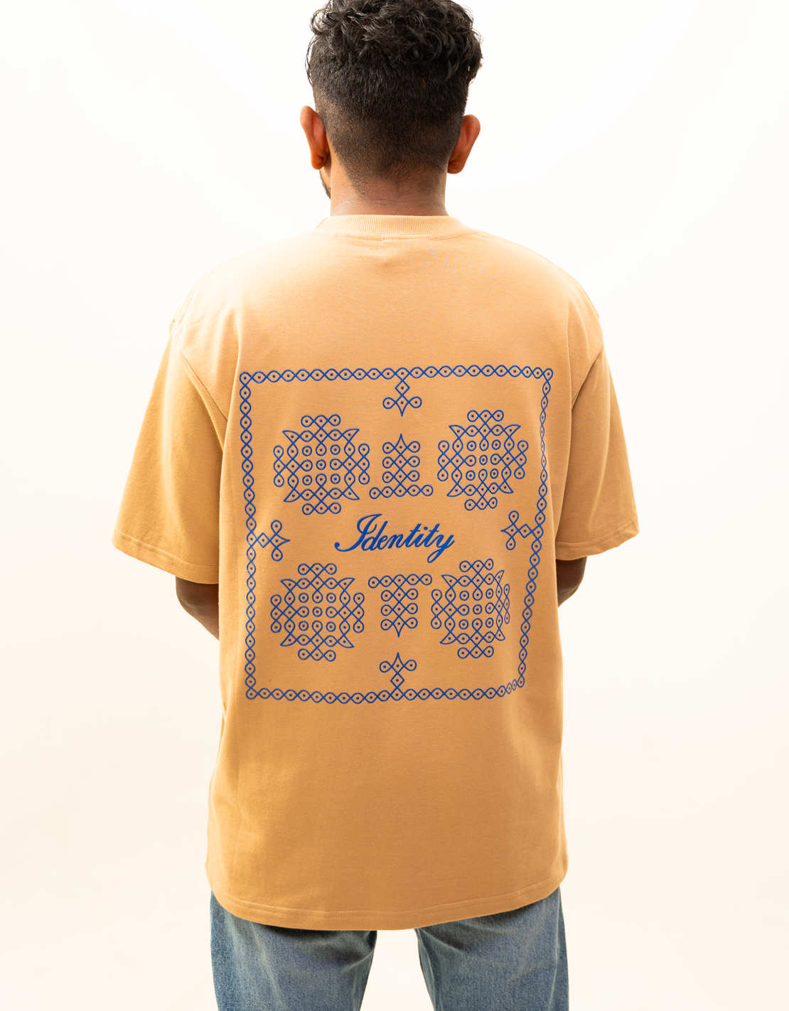 Oversized brown t-shirt with a Kolam design angi clothing